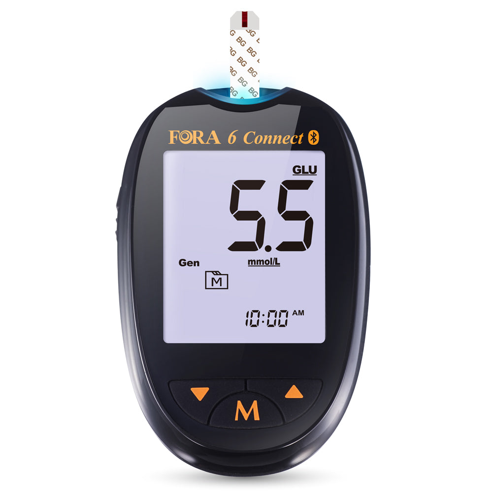 Close-up of FORA 6 Connect Bluetooth glucose and ketone meter with test strip inserted, showing 5.5 mmol/L reading on large backlit display.